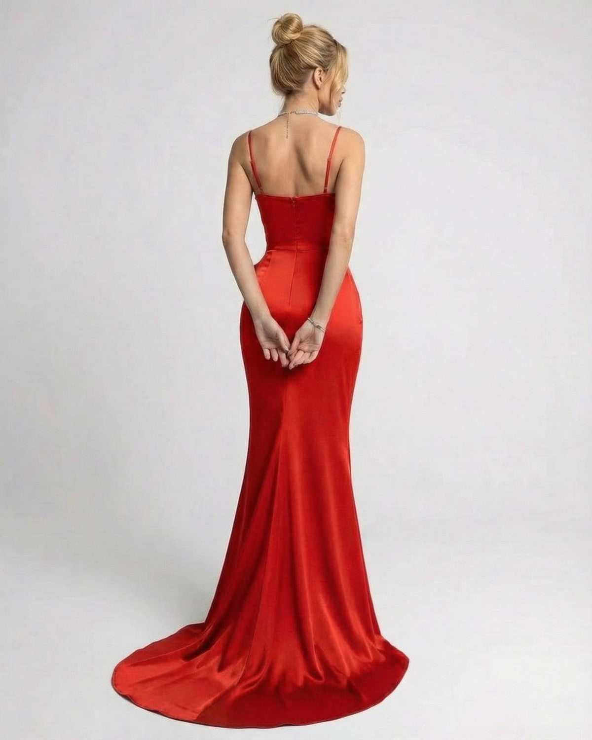 Valencia Maxi Dress by Lauven - Asymmetrical sleeveless red dress with a sculptural silhouette and oversized bow detail.