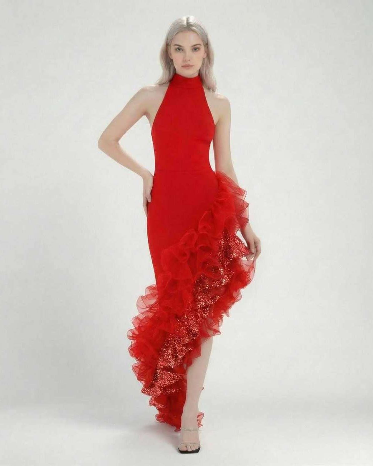 Valencia Maxi Dress by Lauven – Red halter neck dress with asymmetrical ruffle detail and flowing skirt.