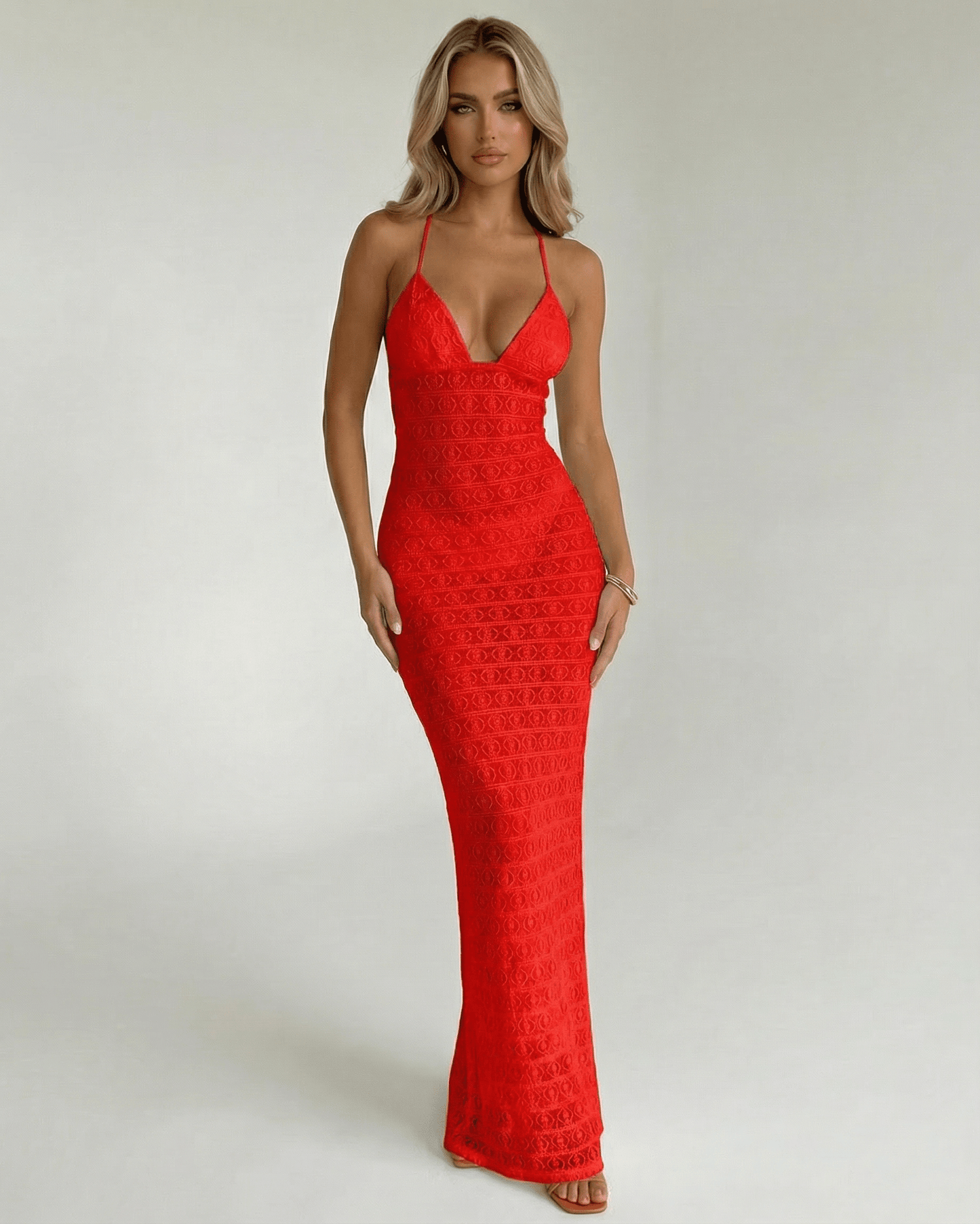Valencia Maxi Dress by Lauven in bold red lace with a V-neckline and fitted silhouette.