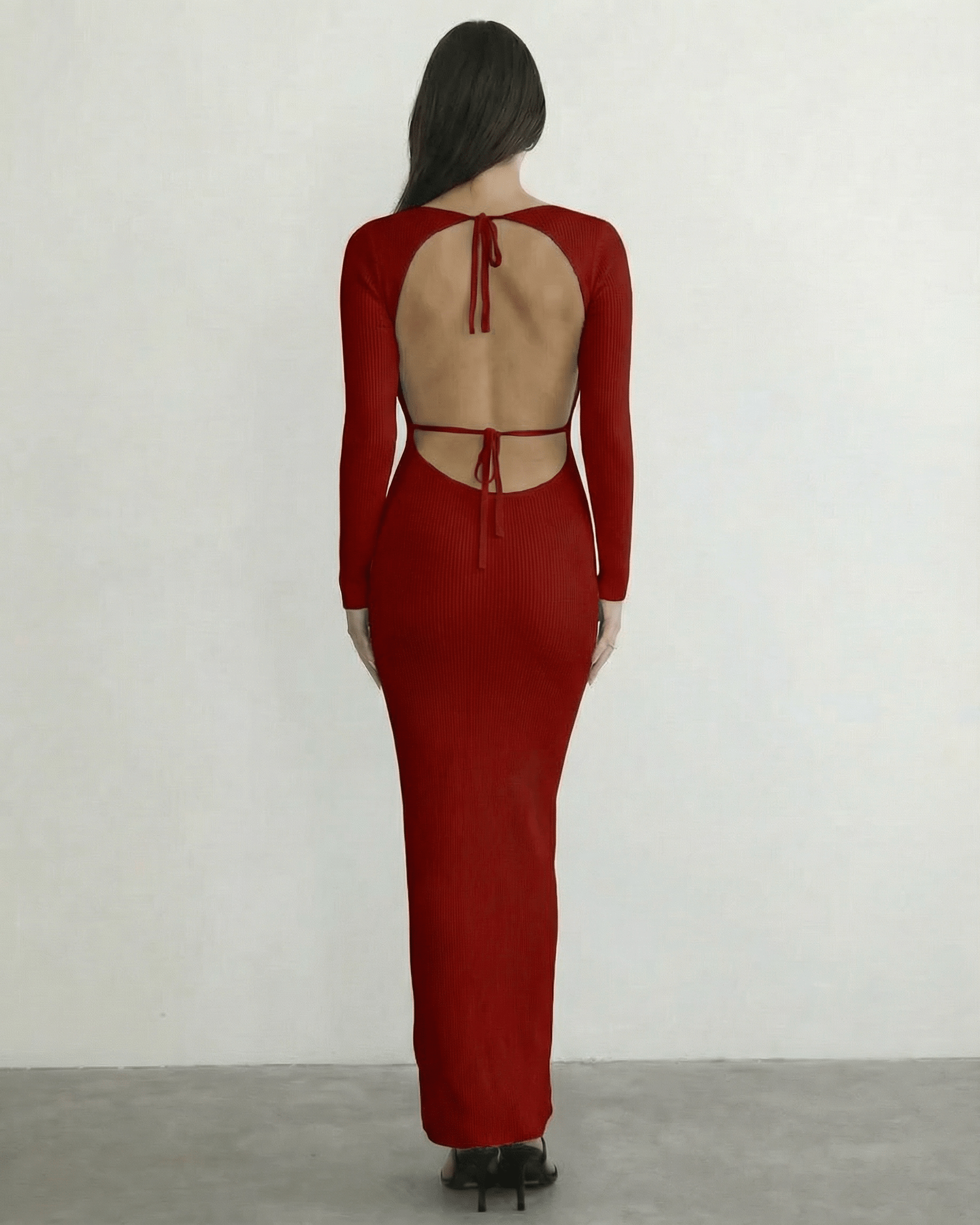 Valencia Maxi Dress by Lauven - back view of a red ribbed knit long sleeve maxi dress with open back tie detail.