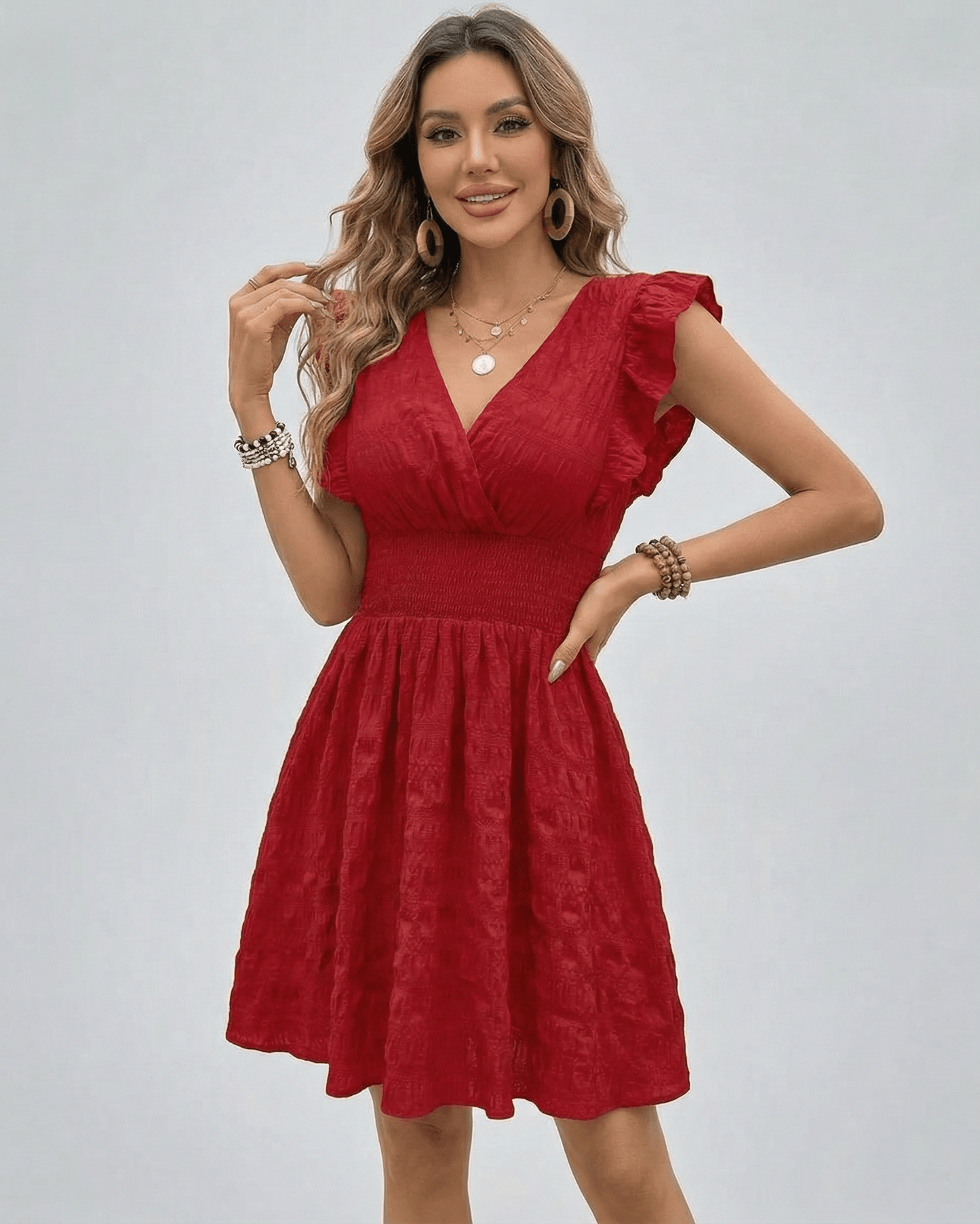 Valencia Mini Dress by Lauven - V-Neck Sleeveless Red Mini Dress with Smocked Waist and Flattering Silhouette.