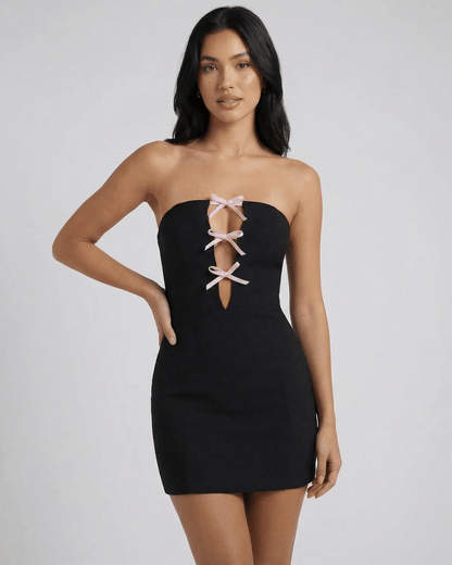 Valencia Mini Dress by Lauven featuring a strapless design and bow detail, showcasing a sleek bodycon silhouette.