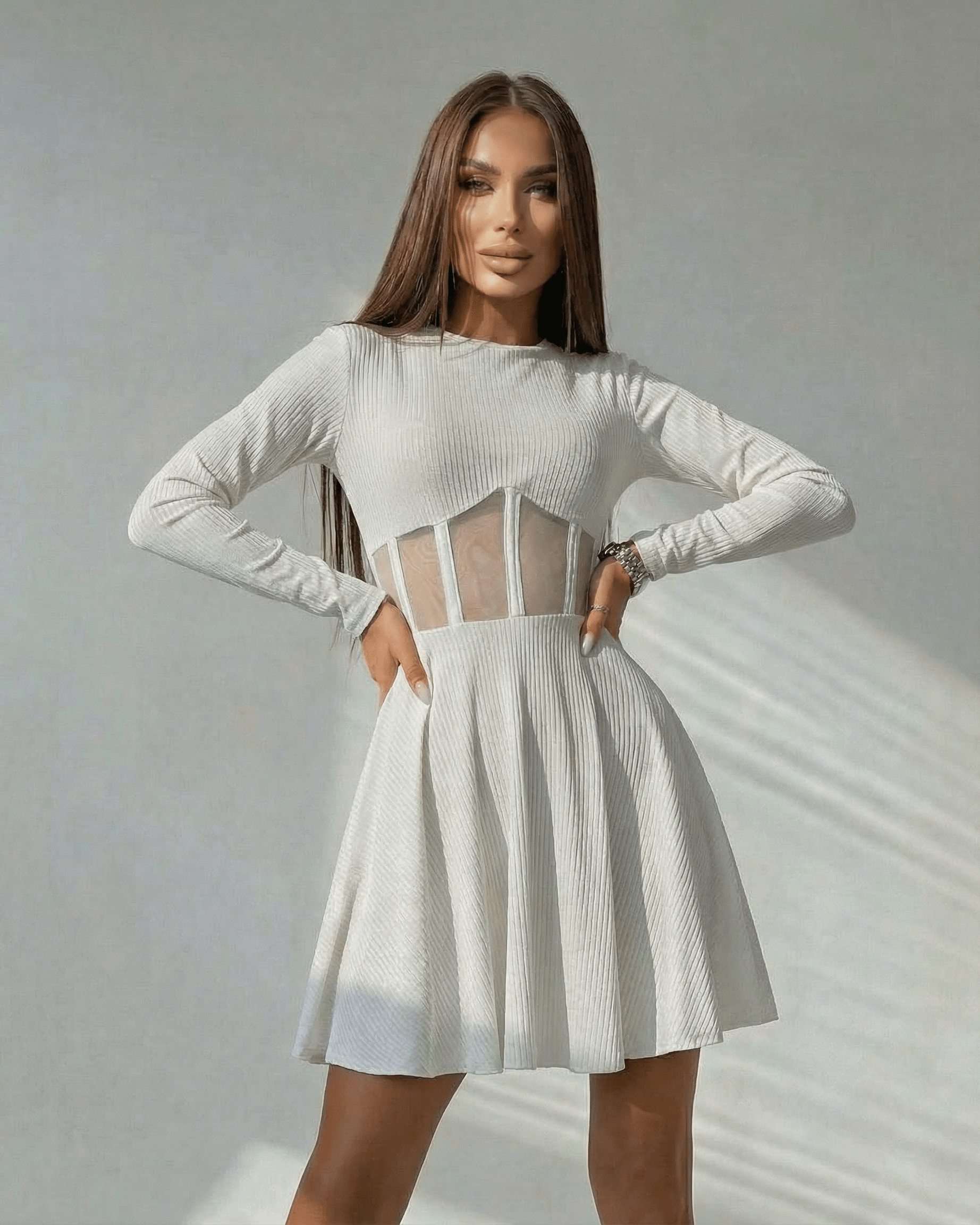 Valencia Mini Dress by Lauven – White long sleeve A-line dress with sheer corset panel and sculpted waist.