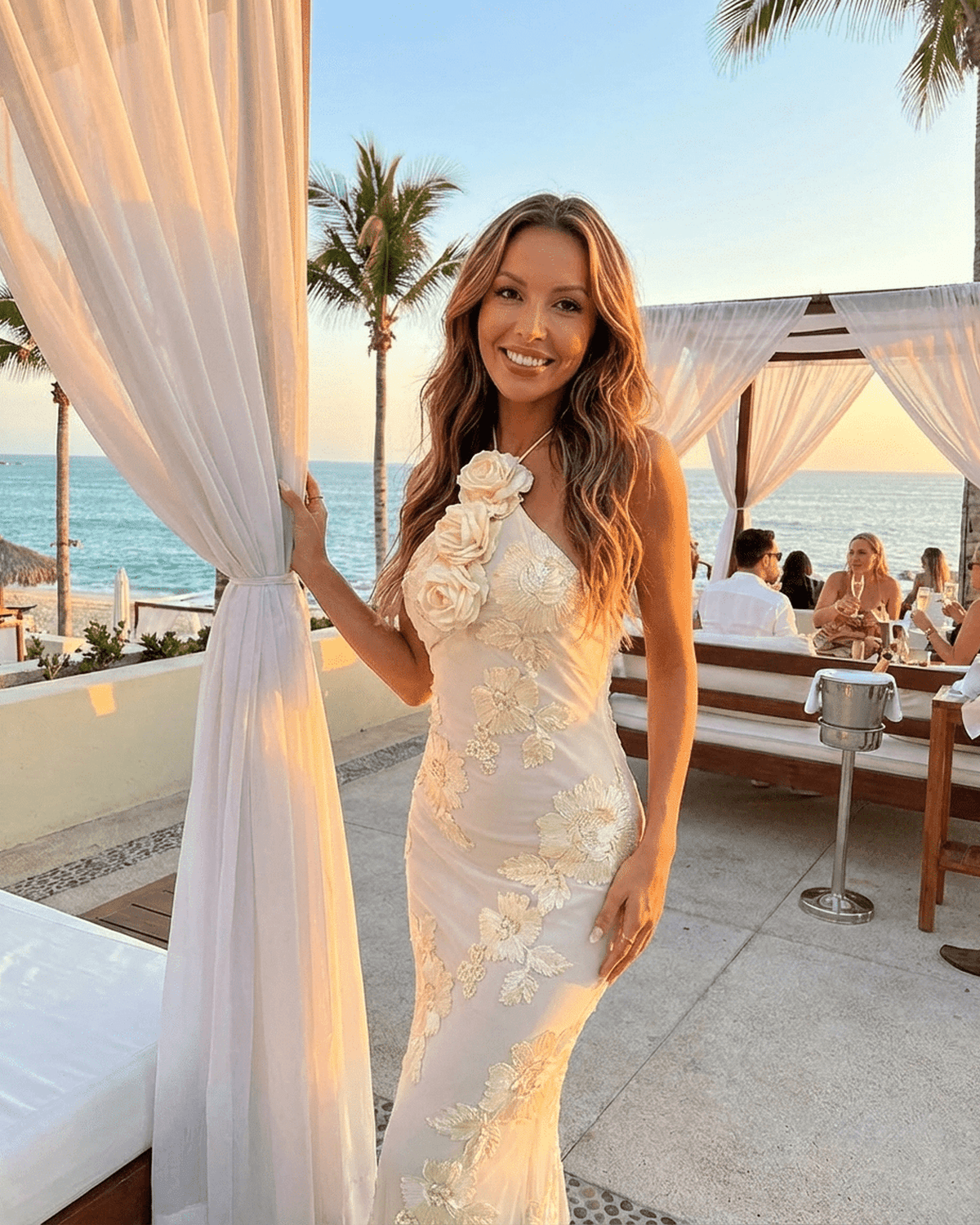 Valeria Maxi Dress by Lauven, halter neck with 3D floral foil print, perfect for beachside elegance.