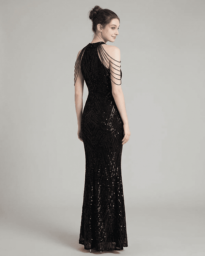 Vega Maxi Dress by Lauven, elegant black sequin mermaid gown with halter neckline and stylish shoulder details.