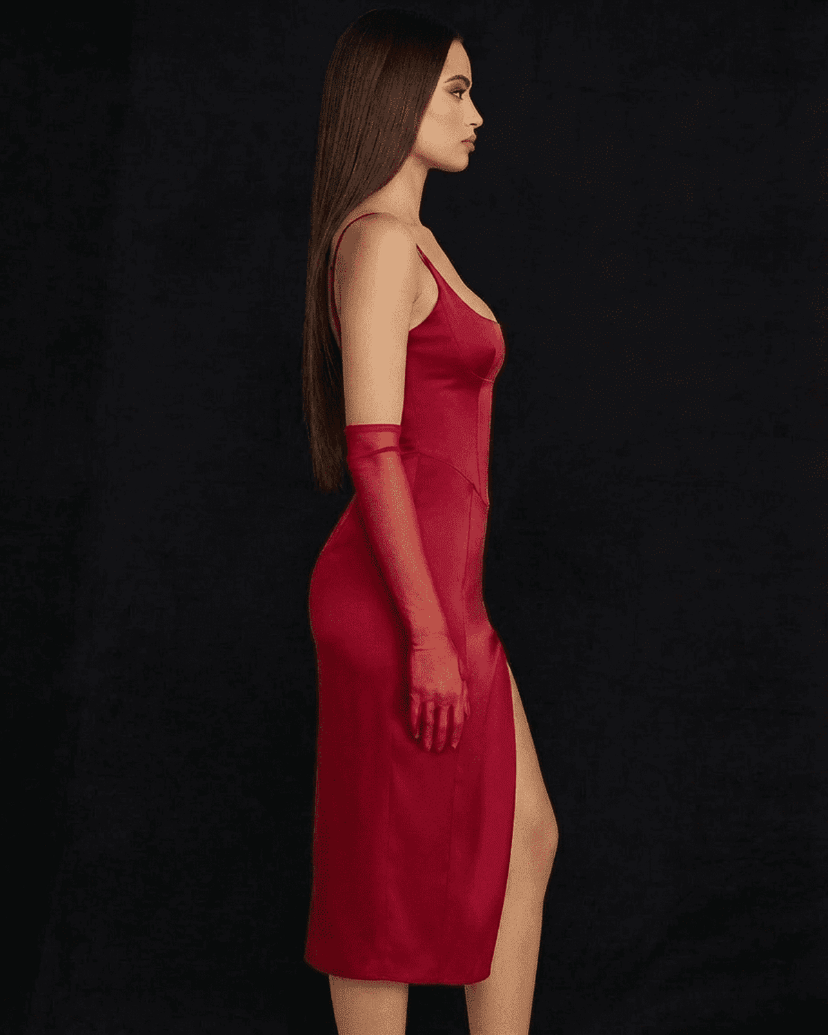 Vega Midi Dress by Lauven, featuring high slit, bodycon silhouette in vibrant red satin.