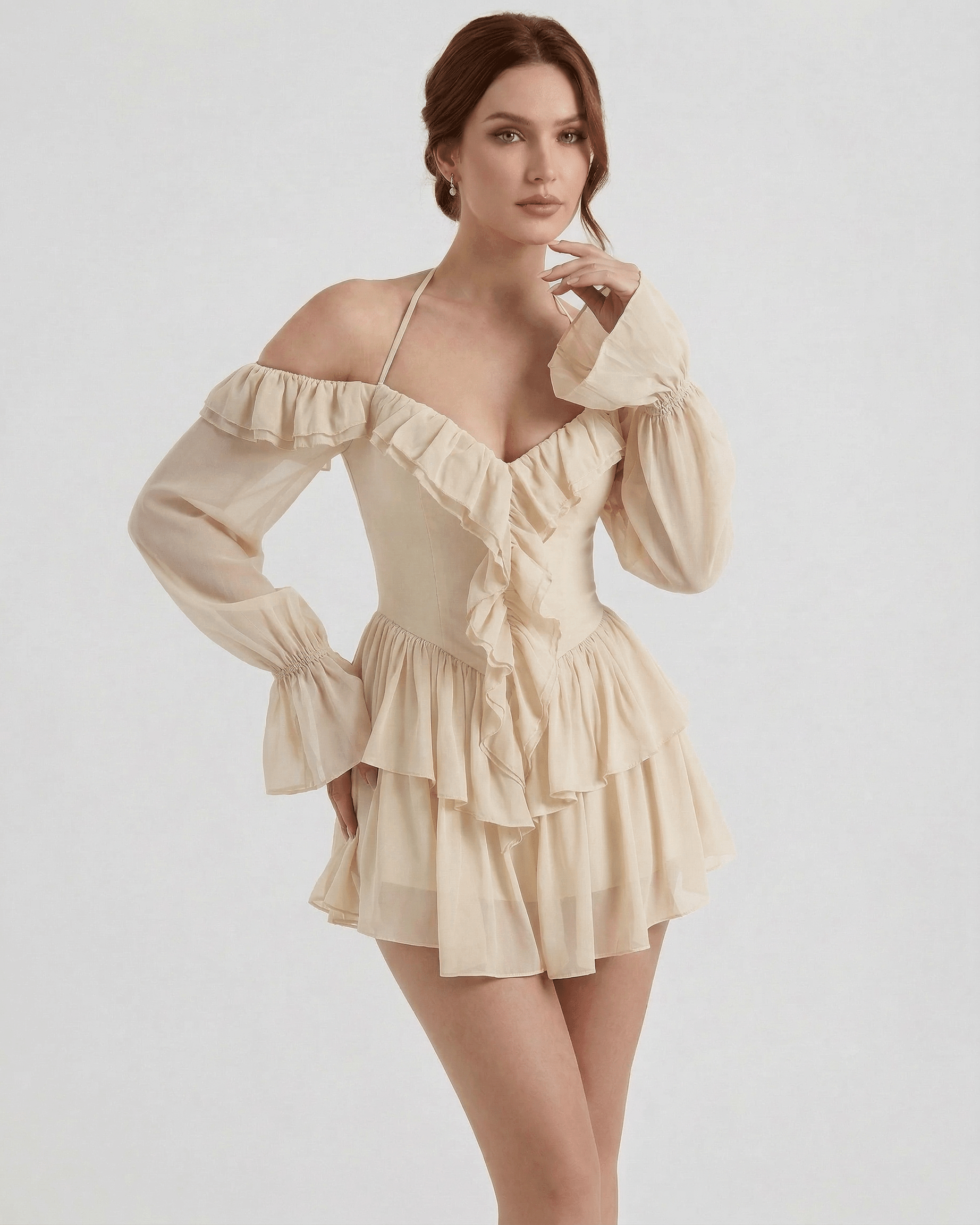 Velina Mini Dress by Lauven – Beige Ruffle Halter Mini Dress with Sheer Sleeves and flowing silhouette.