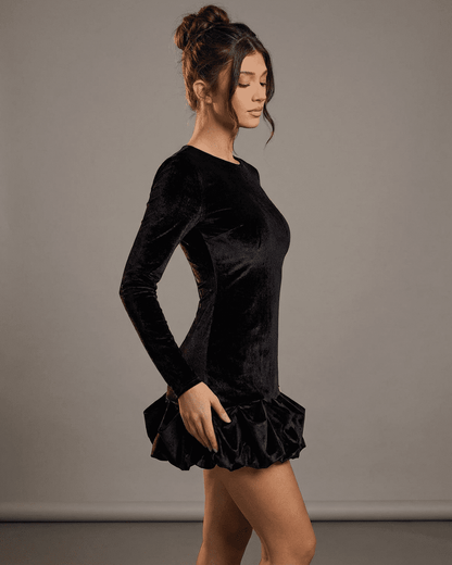 Velora Mini Dress Black by Lauven - Luxe velvet with pleated hem and bodycon fit, ideal for a chic look.