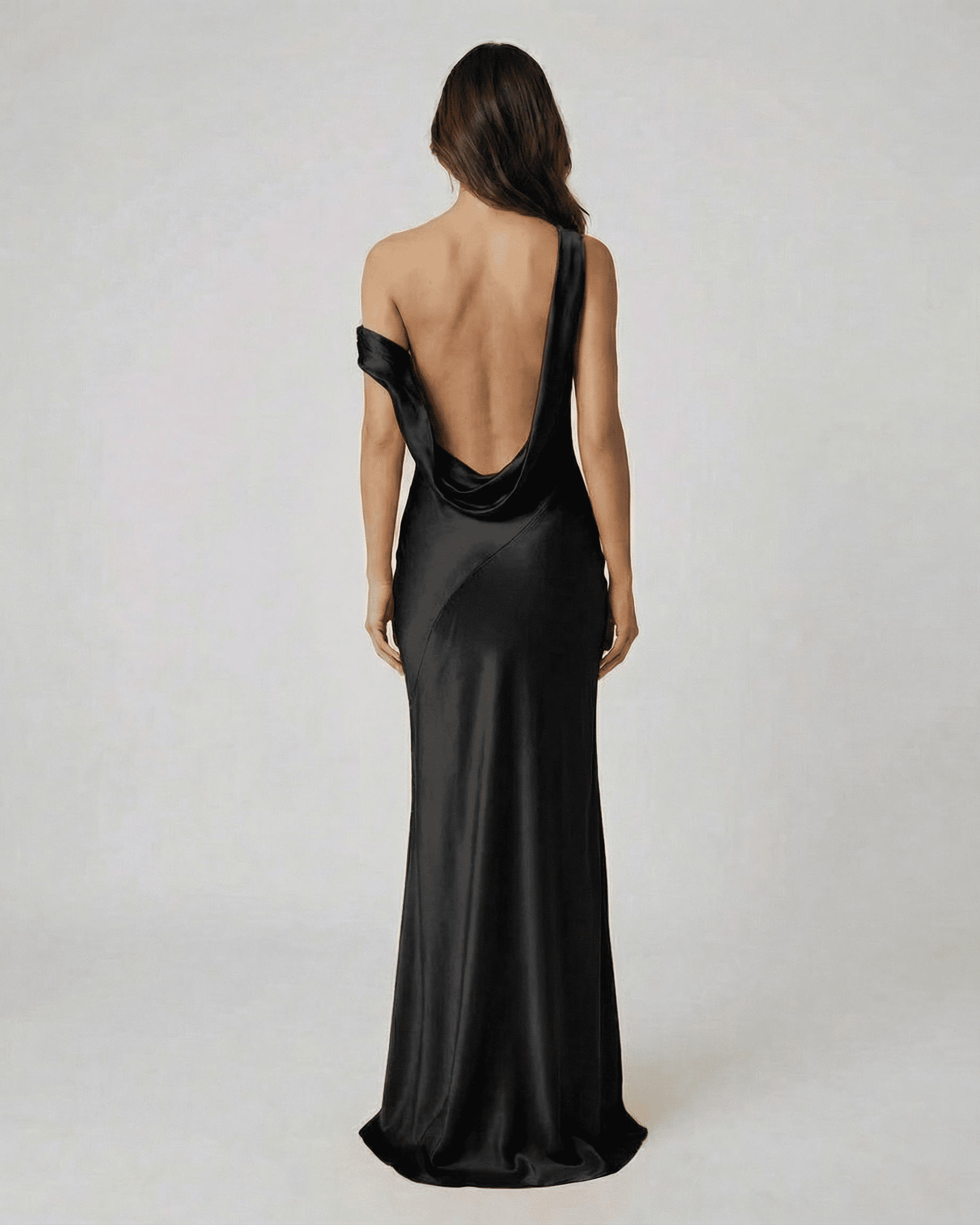 Veloria Maxi Dress by Lauven featuring a sleek black satin design with an open back, perfect for elegant occasions.