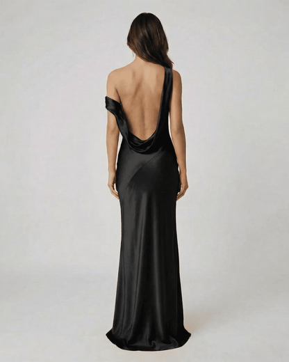 Veloria Maxi Dress by Lauven featuring a sleek black satin design with an open back, perfect for elegant occasions.