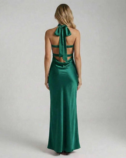 Back view of Lauven Verde Maxi Dress showcasing elegant emerald satin finish and stylish halter tie.