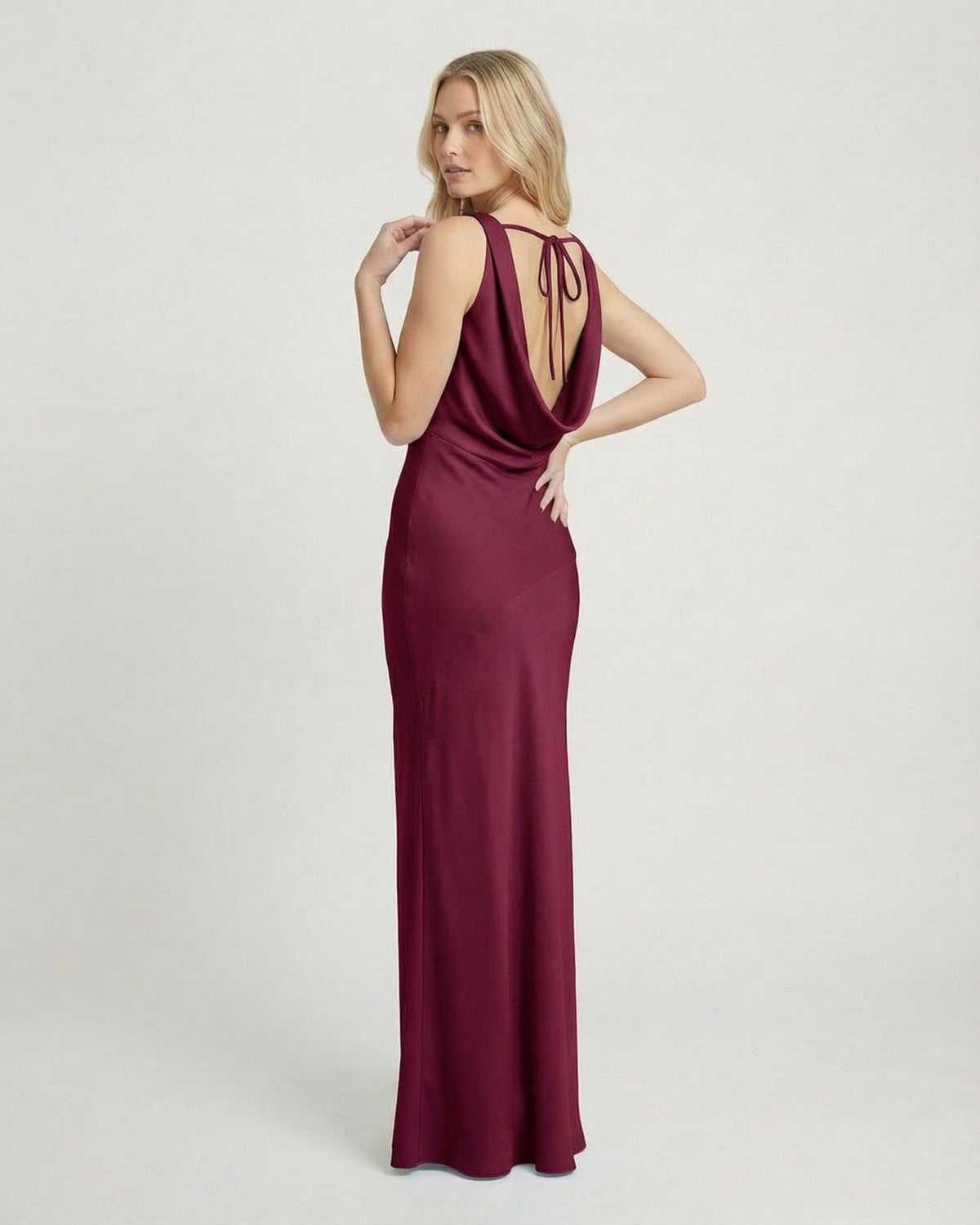 Verona Maxi Dress by Lauven, showcasing a satin-effect cowl neck design in a burgundy hue, elegantly styled from the back.