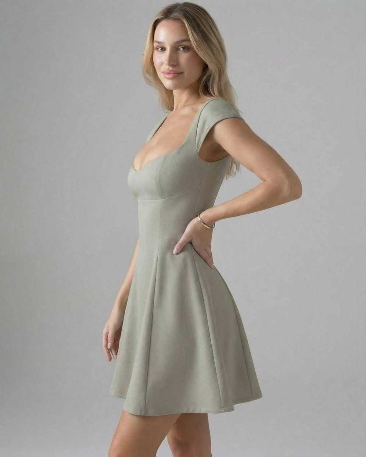 Verona Mini Dress by Lauven, featuring a panelled bodycon design and short sleeves in a stylish silhouette.