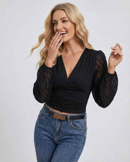Lauven Verona Pullover – Women's black V-neck long sleeve pullover with stylish lantern sleeves and patchwork design.