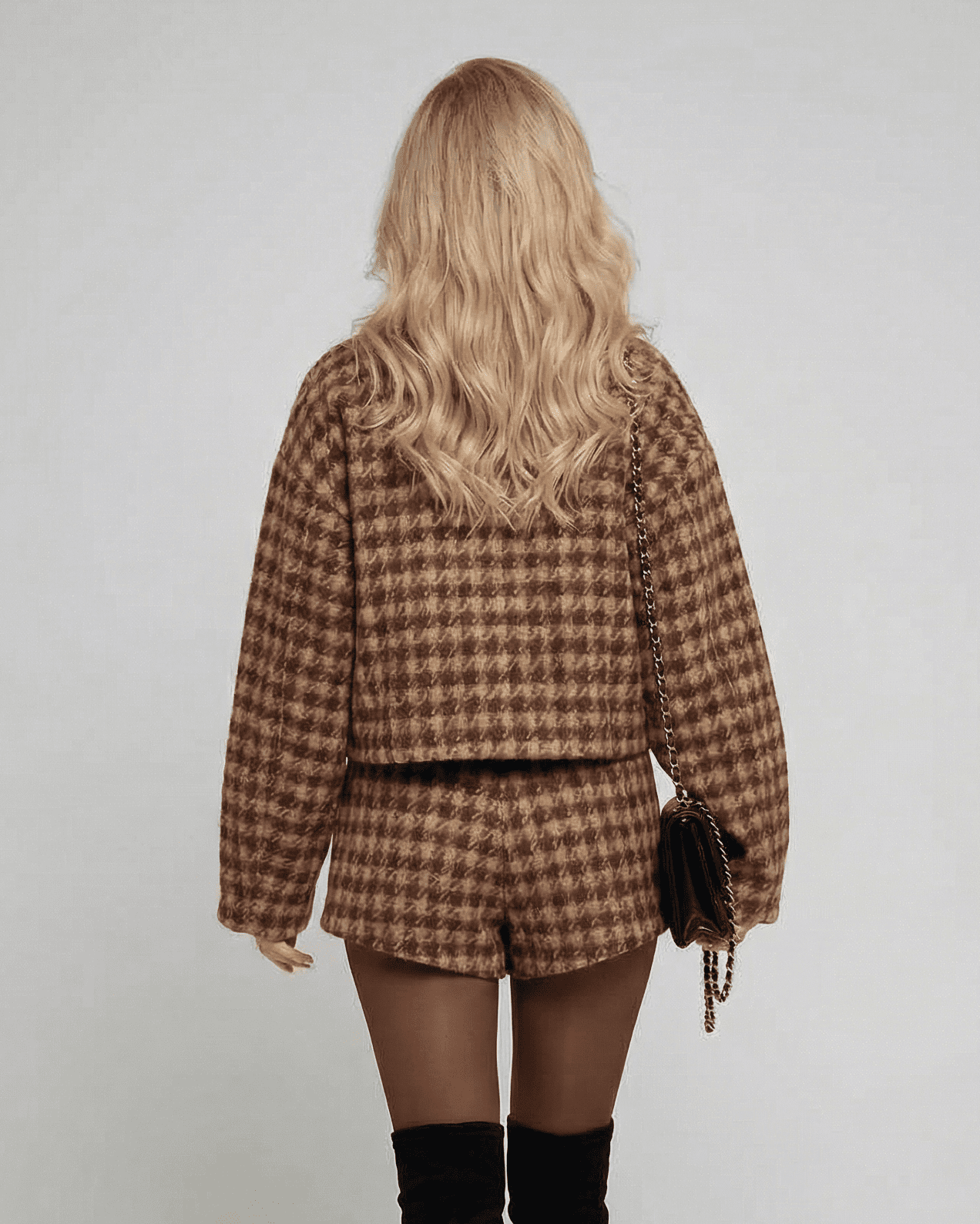 Verona Set by Lauven featuring a chic two-piece design with tailored shorts and a structured long-sleeve top.