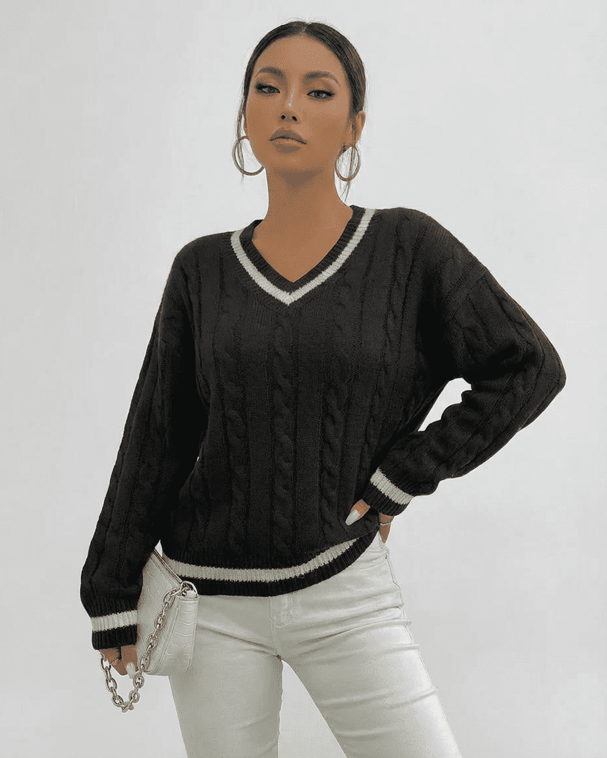Verona Sweater by Lauven featuring cable knit texture, V-neck design, and relaxed fit for effortless style.