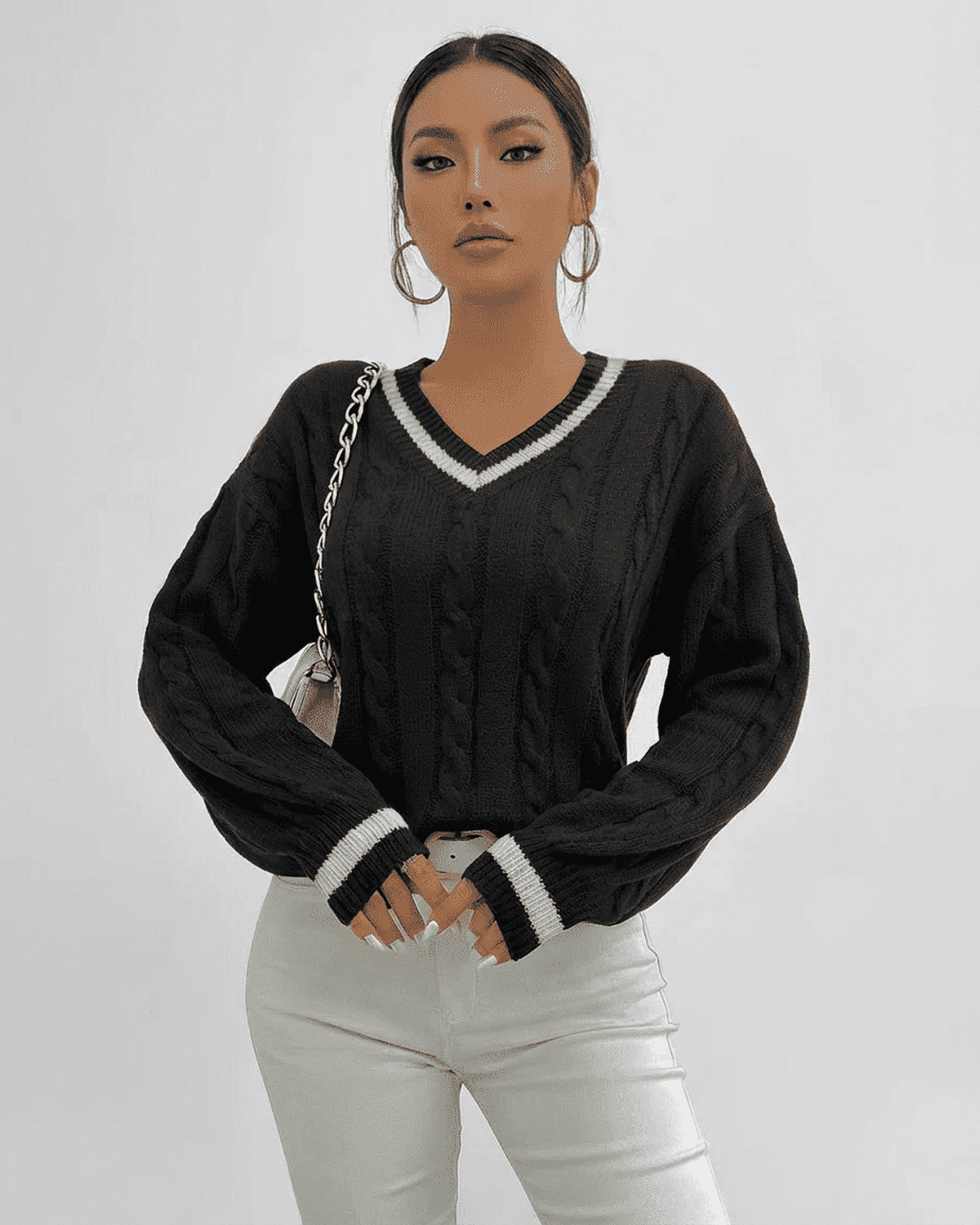 Verona Sweater by Lauven - Black cable knit pullover with V-neck silhouette and contrasting details.