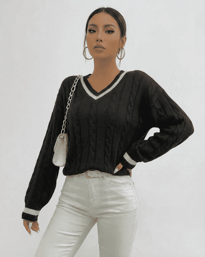 Verona Sweater by Lauven in black cable knit with V-neck and long sleeves, perfect for stylish layering.