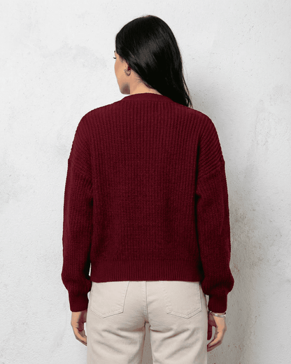 Back view of Vesper Cardigan in luxurious burgundy knitwear by Lauven, showcasing its classic design and relaxed fit.