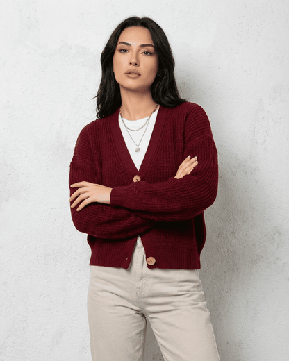 Vesper Cardigan by Lauven, luxurious burgundy knitwear with classic V-neck design, ideal for layering and comfort.