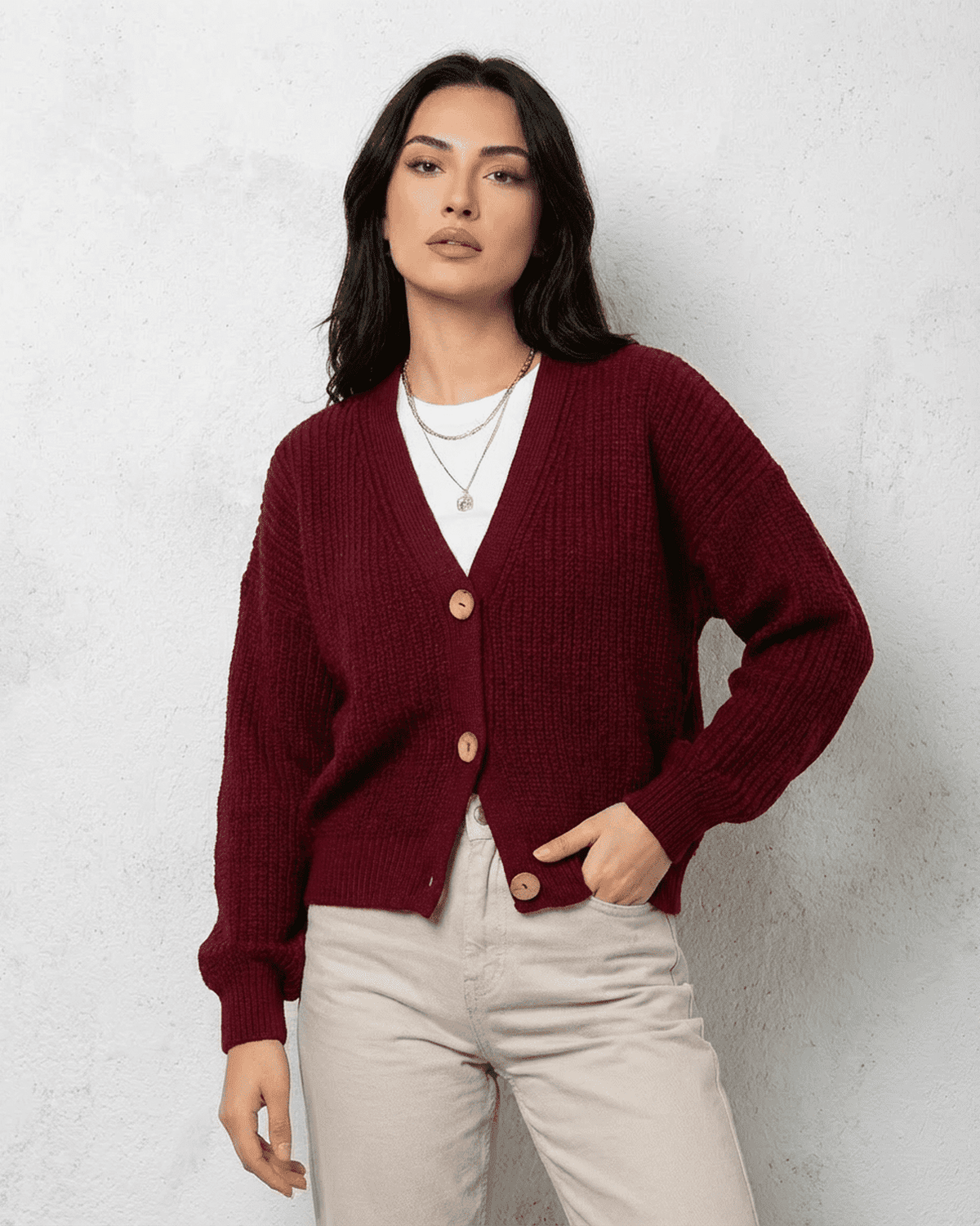 Vesper Cardigan by Lauven in luxurious burgundy knitwear with a classic V-neck design and button closure.