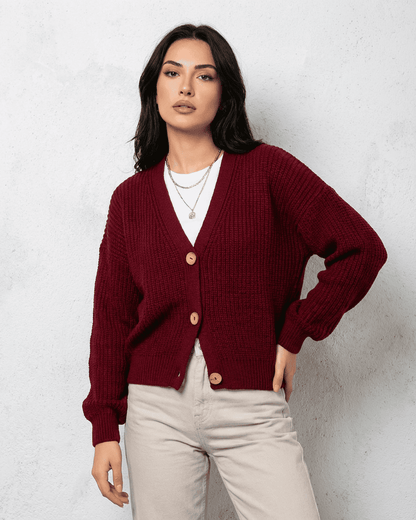 Vesper Cardigan by Lauven – Luxurious burgundy knitwear with a classic V-neck design and button details.