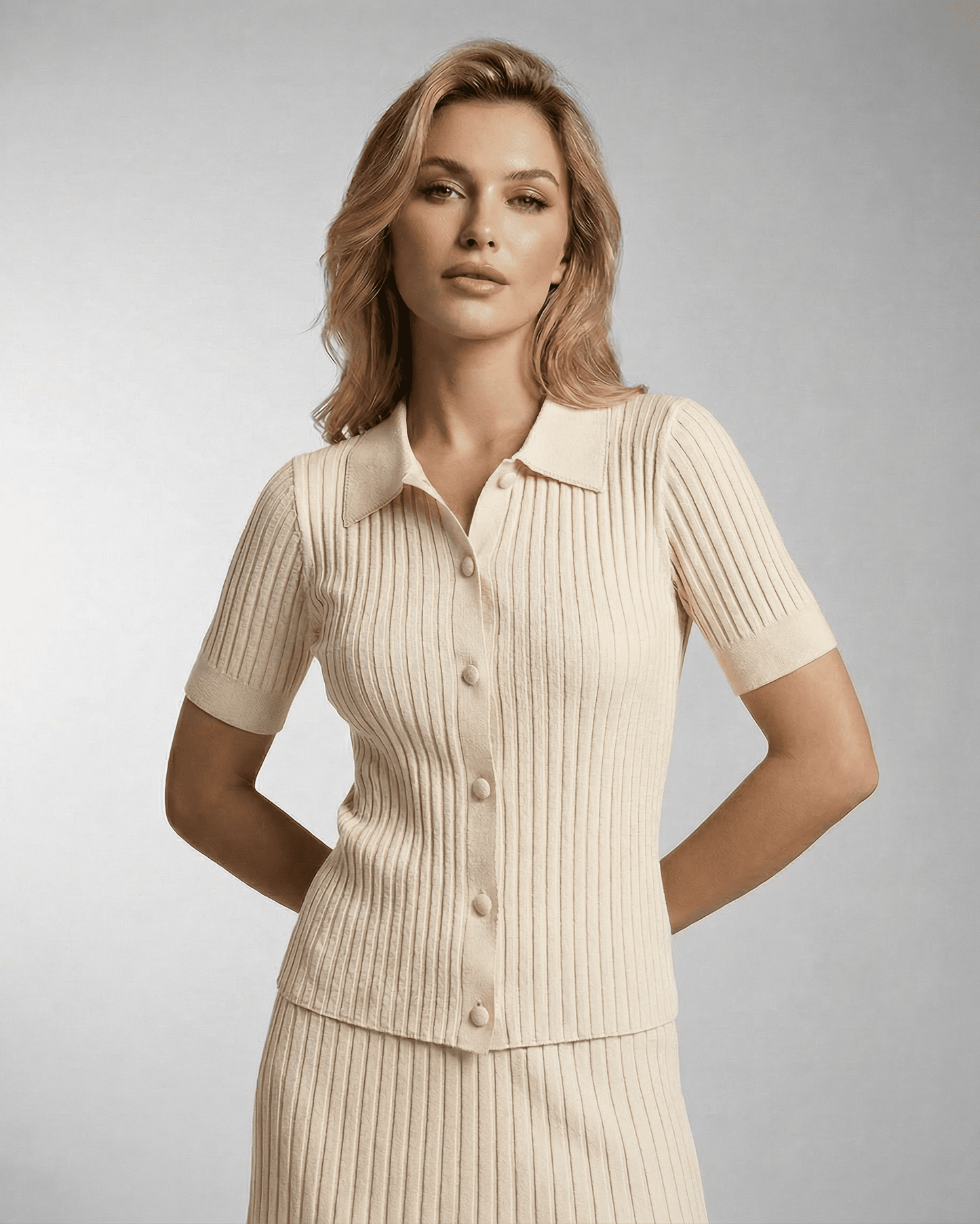 Siena Polo Shirt by Lauven - Women's slim knit polo shirt featuring fine rib texture and a modern fit.