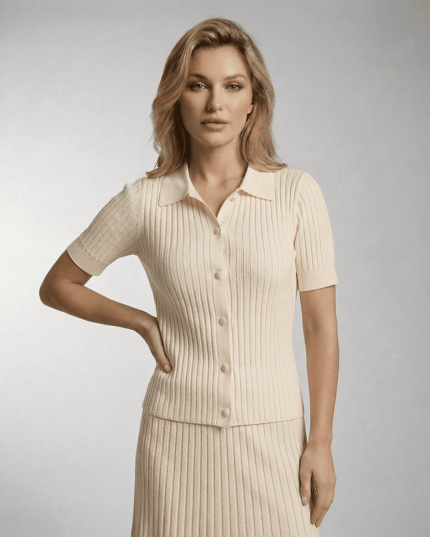 Siena Polo Shirt by Lauven, women's slim knit polo with fine rib texture in a stylish light color.