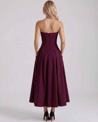 Elegant back view of Aveline Midi Dress, showcasing the structured polyester, V-neck design, and flowing skirt from Lauven.