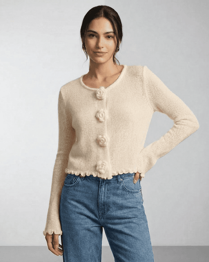 Ivory Cardigan by Lauven featuring floral button details and a soft knit texture, perfect for a chic look.