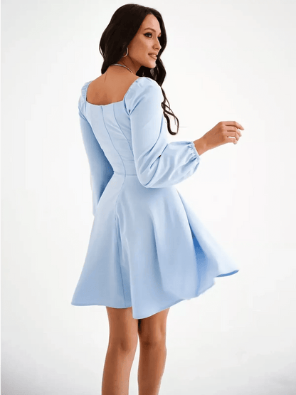 Light blue mini dress with square neckline and puffed sleeves, perfect for events and summer occasions.