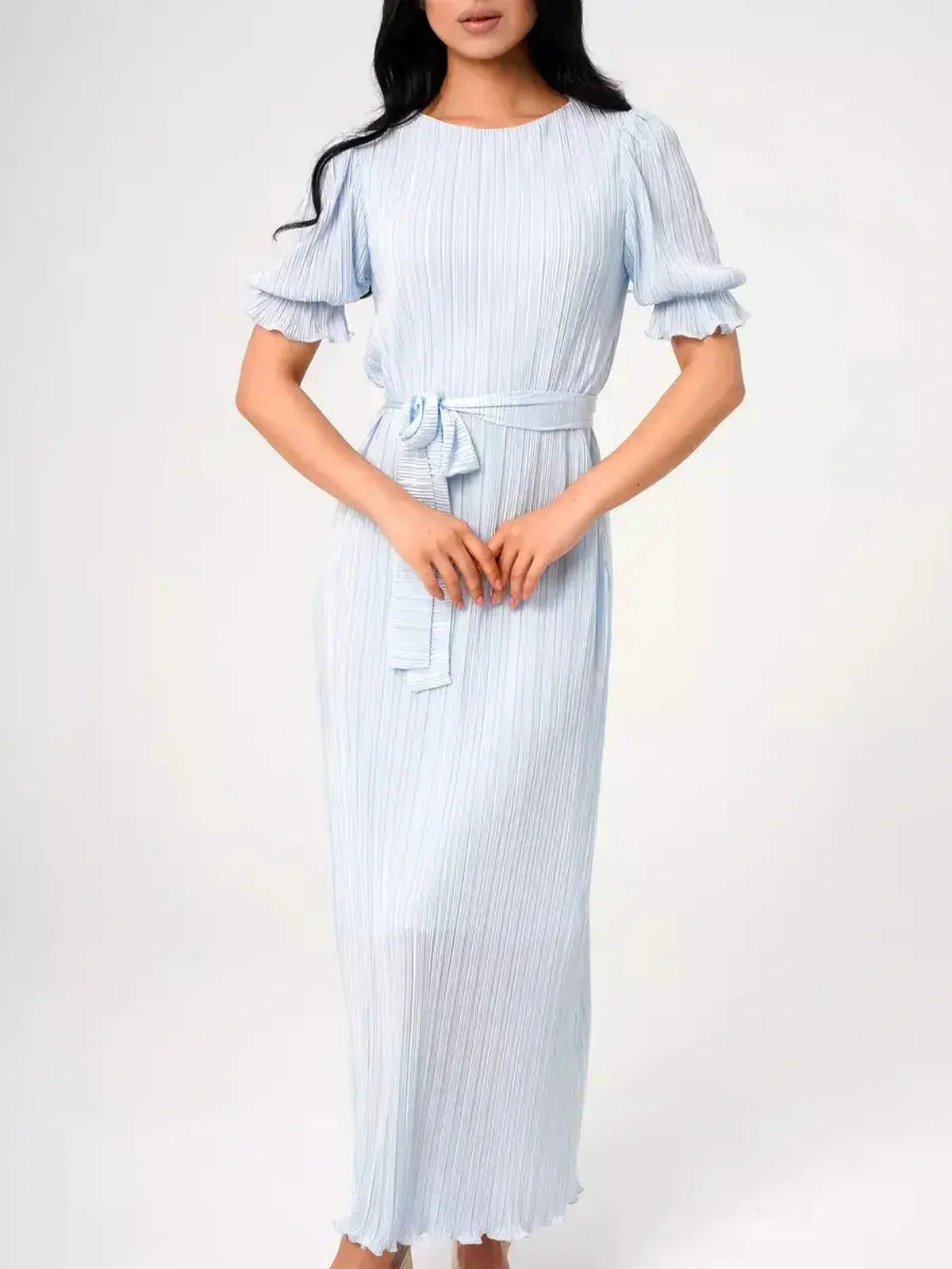 Celeste Flow Maxi Dress in light blue, featuring pleats and puff sleeves, perfect for summer weddings and special occasions.