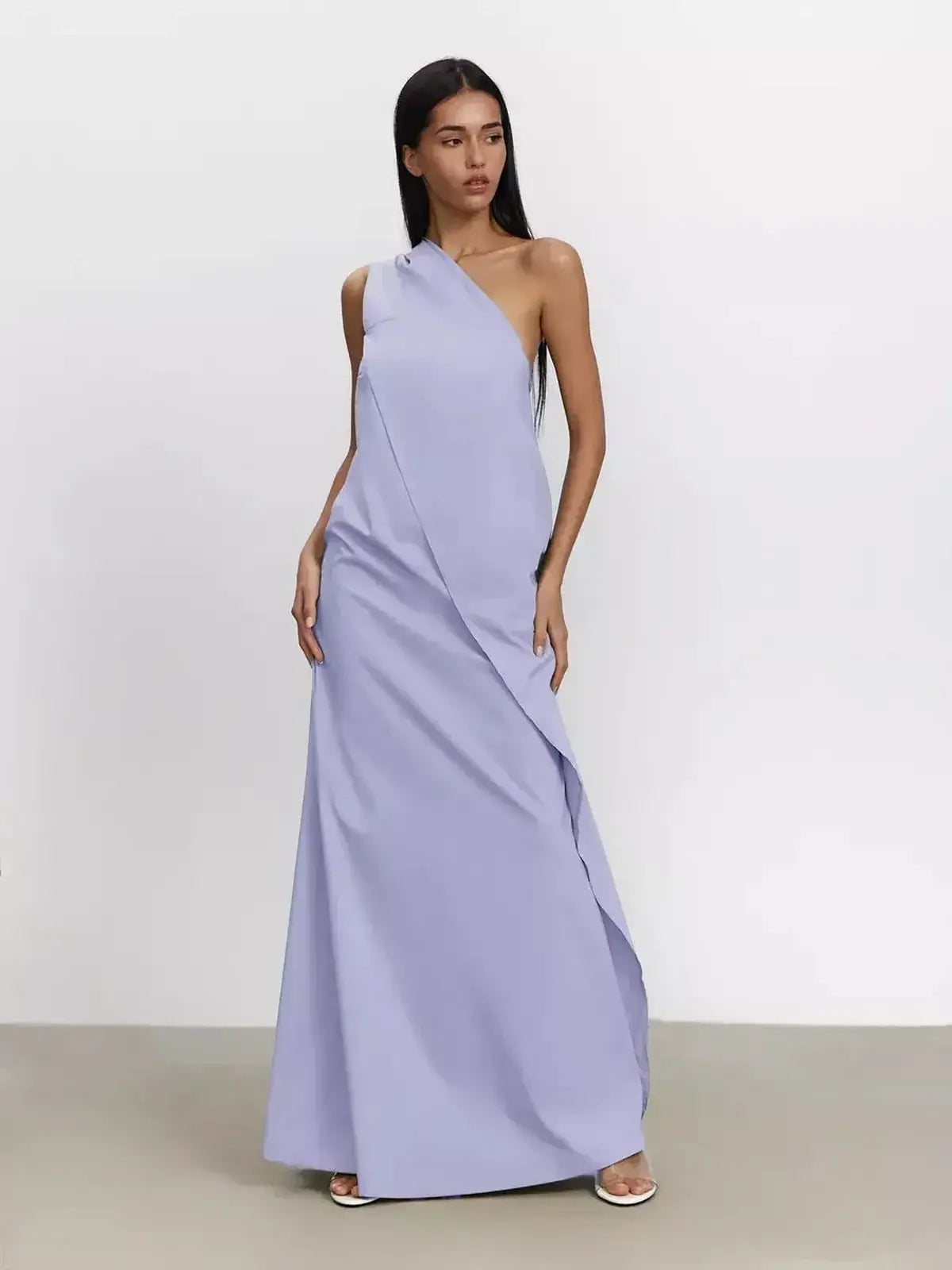 Lilac Flow Maxi Dress featuring sculptural draping and one-shoulder elegance for summer soirées.