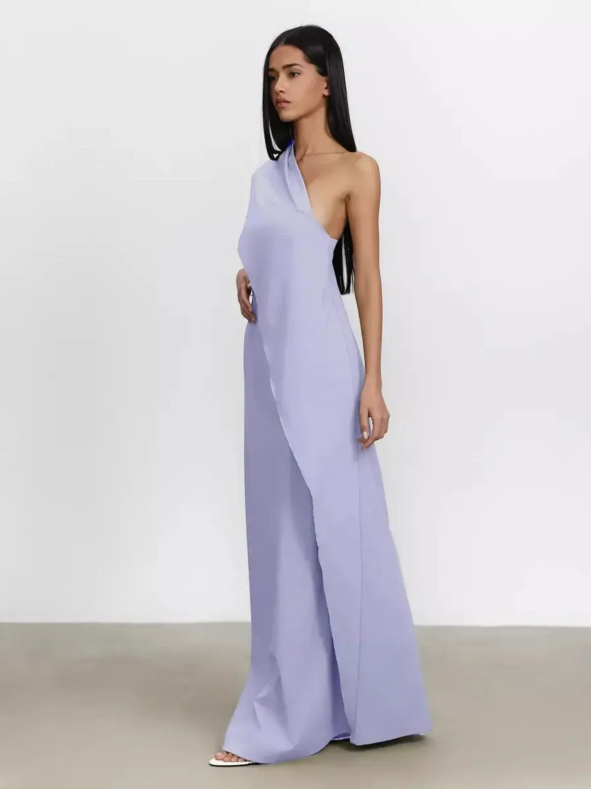 Lilac Flow Maxi Dress featuring a sculptural one-shoulder design and soft asymmetrical draping, ideal for elegant summer events.