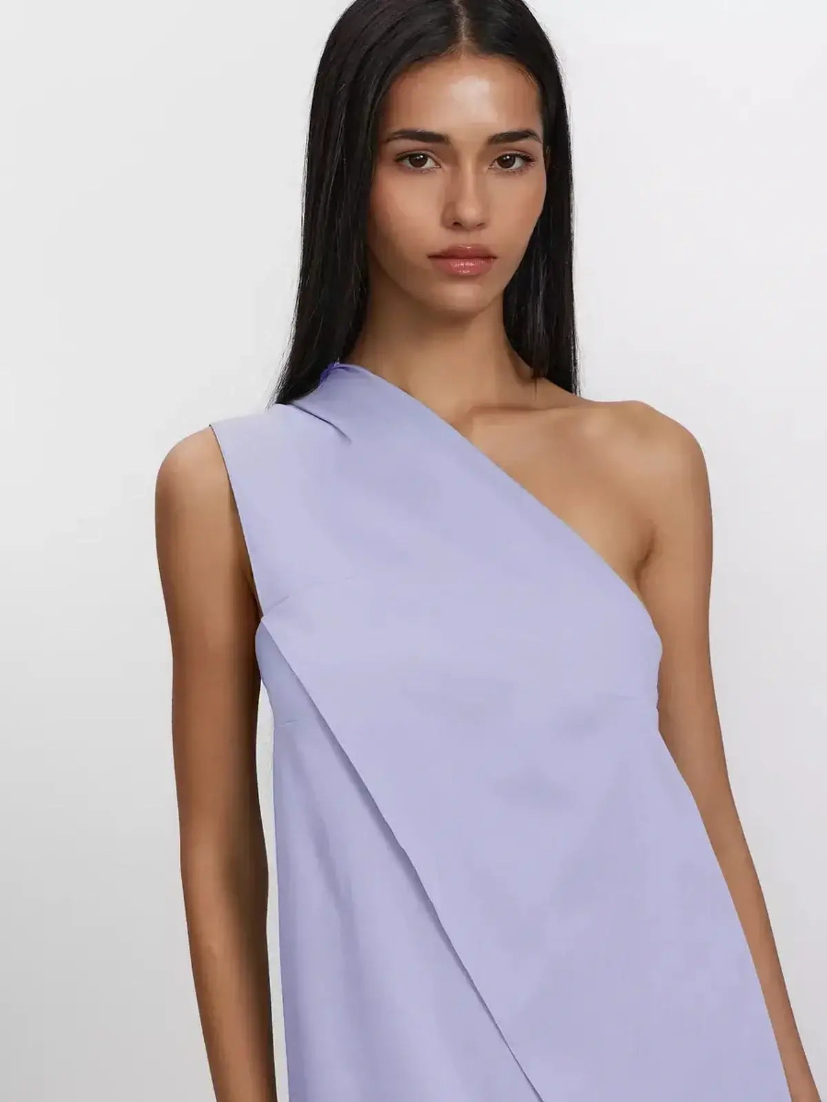 Lilac Flow Maxi Dress featuring one-shoulder design and soft draping, perfect for elegant summer occasions.