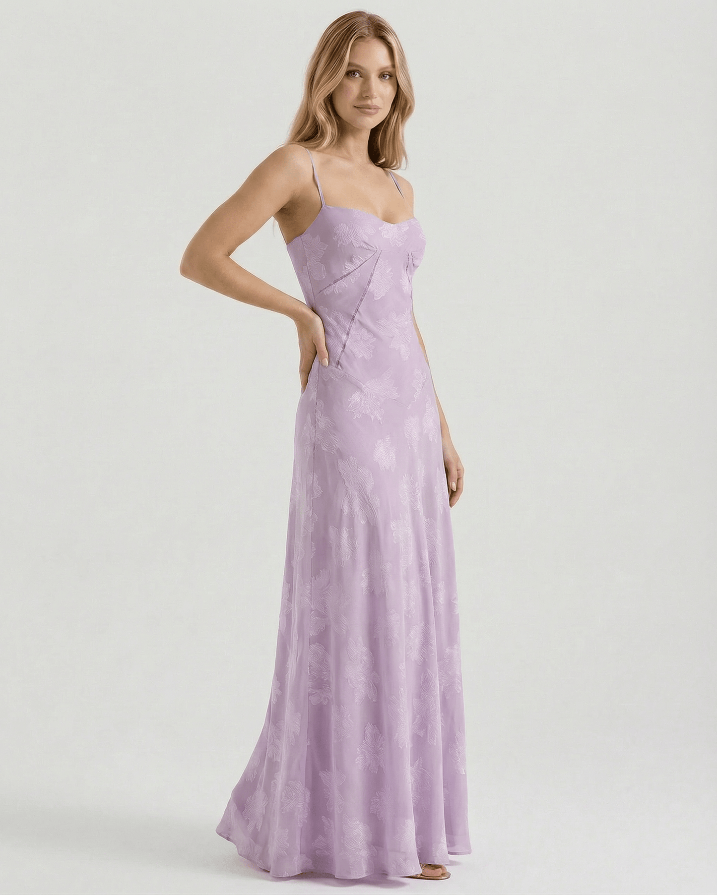 Liliora Maxi Dress by Lauven, showcasing a floral print, sheer fabric, and elegant lavender silhouette.