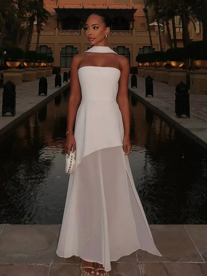 Elegant Lily Women's Dress, a stunning white maxi dress with a structured bodice and flowing chiffon skirt, perfect for evening events.