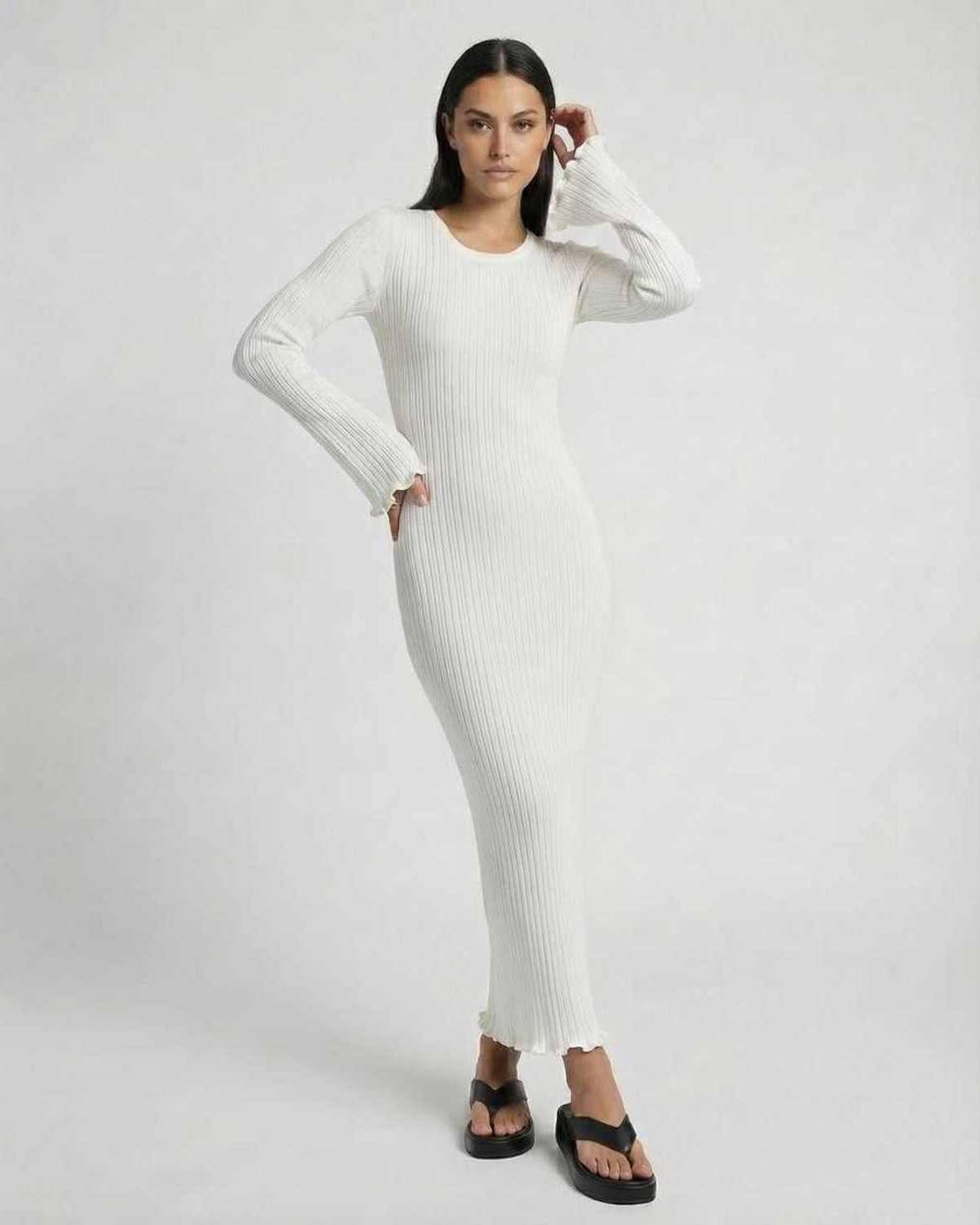 Lauven Luna Maxi Dress features a classic ribbed knit design in crisp white with flared sleeves and a smooth silhouette.