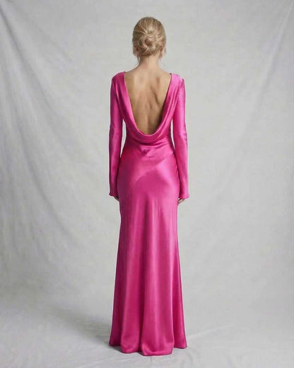Luna Maxi Dress by Lauven, vibrant pink satin dress with a low draped back and elegant full-length design.
