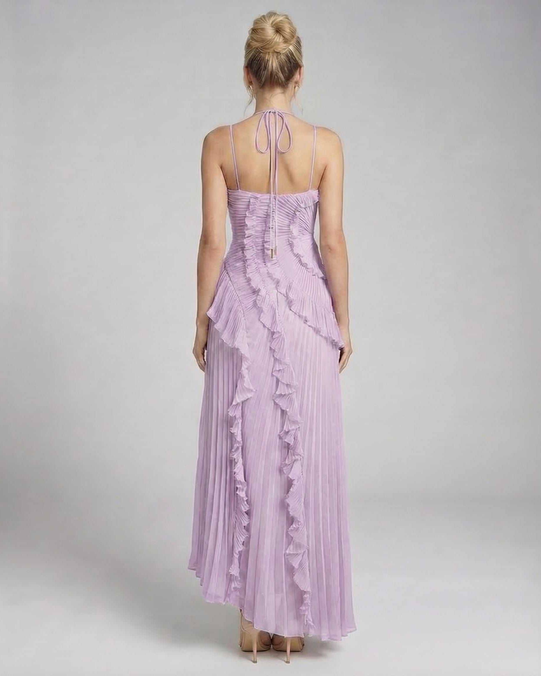 Luna Maxi Dress by Lauven in soft lavender, showcasing pleated fabric and ruffles from the back view.