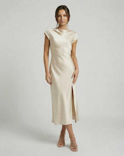 Luna Midi Dress by Lauven, classic satin dress with twisted-back detail, cowl neckline, and soft ivory hue for timeless elegance.