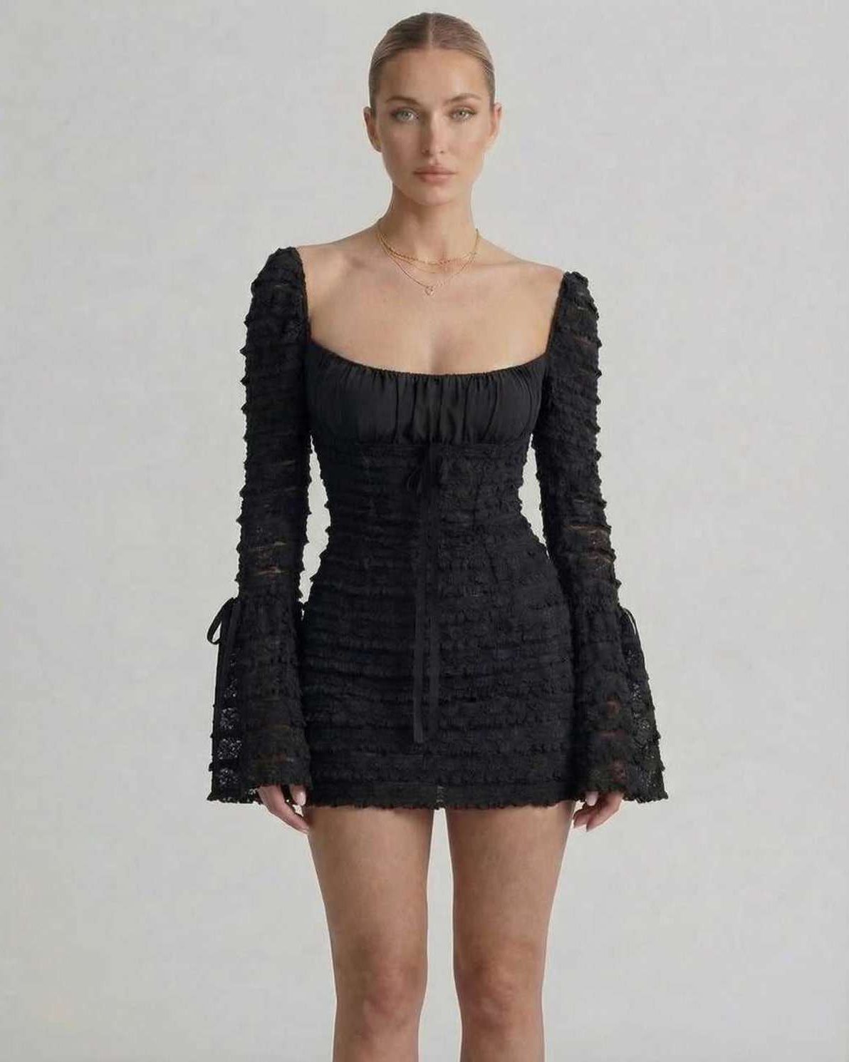 Luna Mini Dress by Lauven, featuring an elegant sheath silhouette with flare sleeves in black.