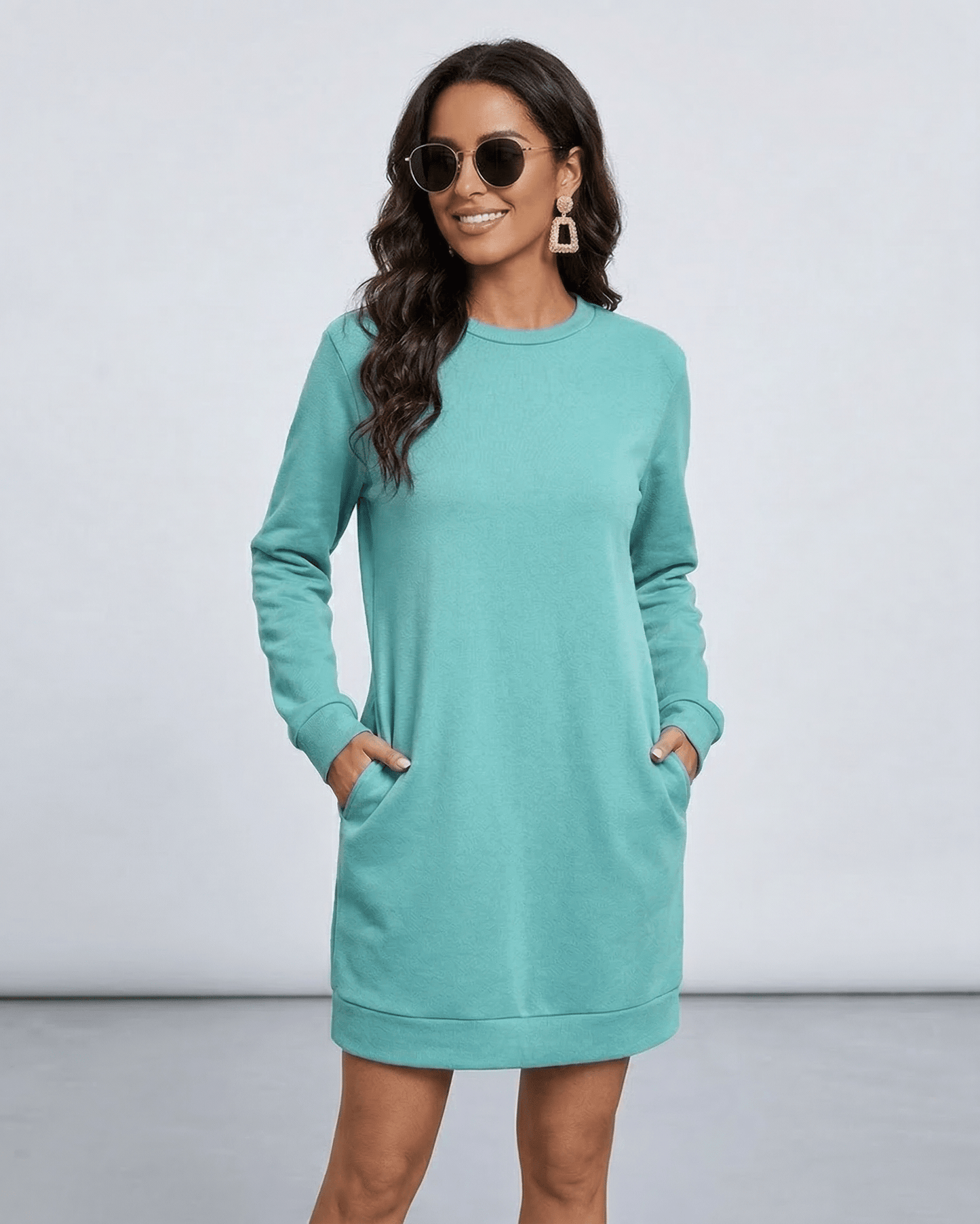 Luna Mini Dress by Lauven in aqua with long sleeves and pockets, perfect for casual style.