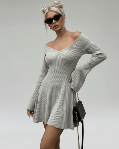 Luna Mini Dress by Lauven in light gray knit with V-neck and flared sleeves, showcasing a stylish silhouette.