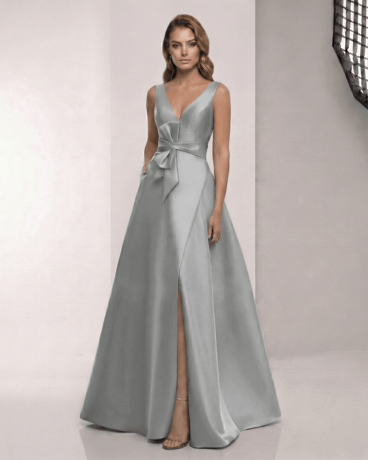 Lunaria Maxi Dress in satin grey sage, featuring V-neck, bow detail, and A-line silhouette by Lauven for a polished look.
