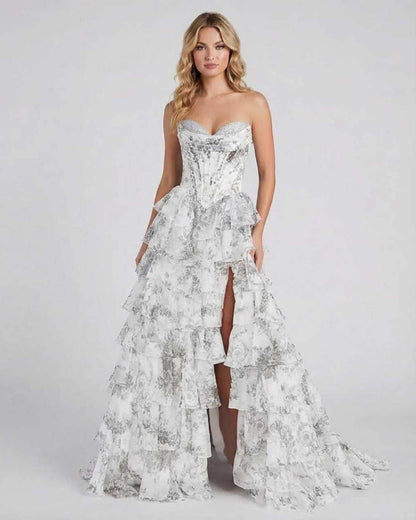 Lunaria Maxi Dress by Lauven featuring silver floral tiered chiffon, strapless design, and high slit.