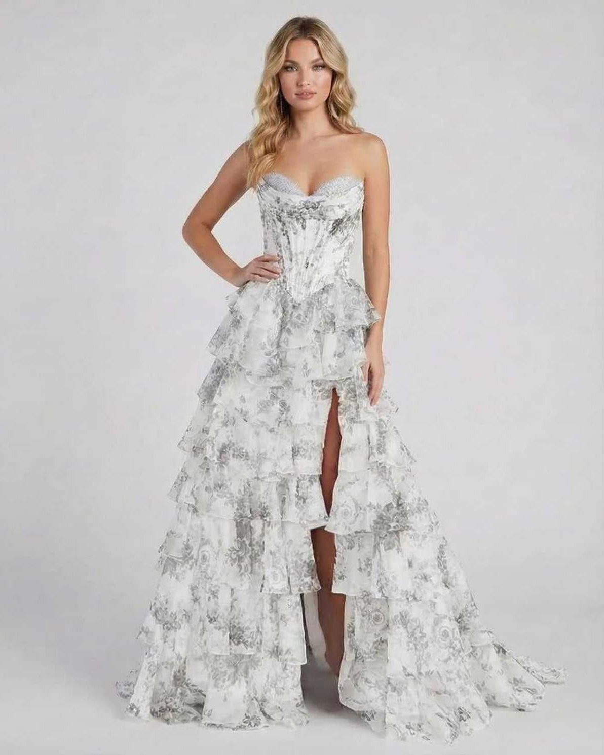 Lunaria Maxi Dress by Lauven in silver floral chiffon with tiered ruffles and high slit.