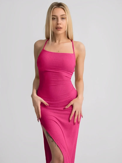 Model wearing a pink Lush Lace Midi Dress with ribbed knit and stylish thigh-high slit.