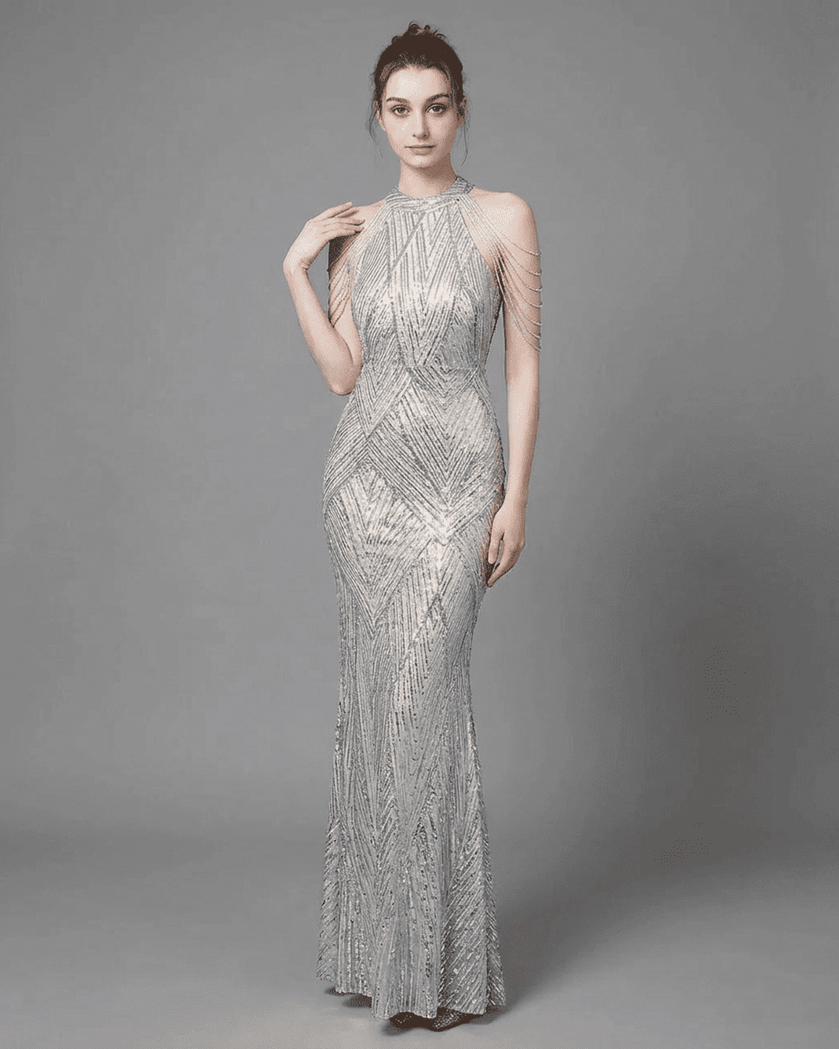 Luxe Maxi Dress by Lauven, featuring a silver sequin mermaid gown with halter neckline and beaded shoulder drapes.