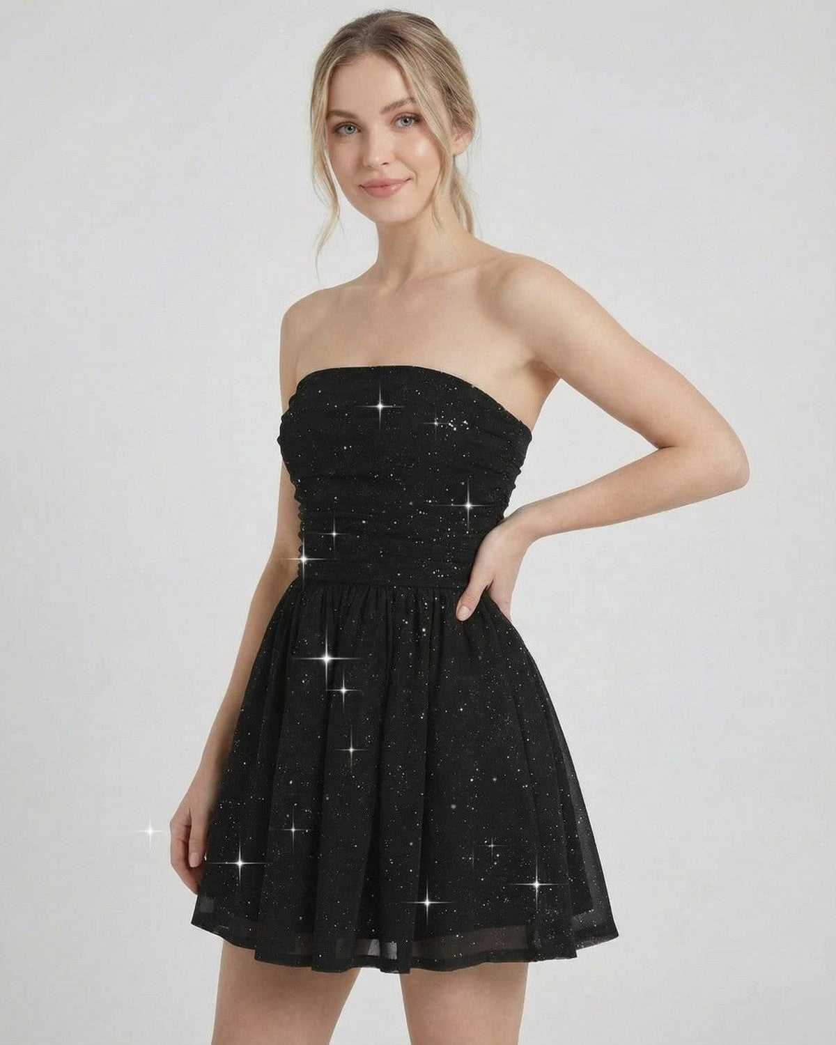 Lyra Mini Dress by Lauven - Strapless black A-line dress with bow detail and subtle shimmer, perfect for elegant occasions.
